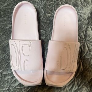 Like new Air Jordan ladies size 10 lavender pink slides